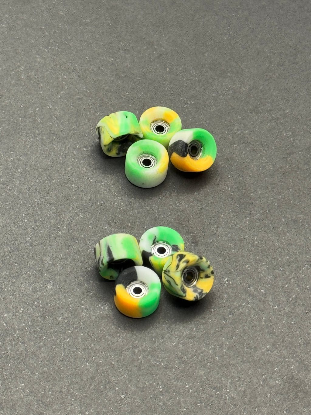 Teak Apex Slim Bowl Swirls GID fingerboard wheels