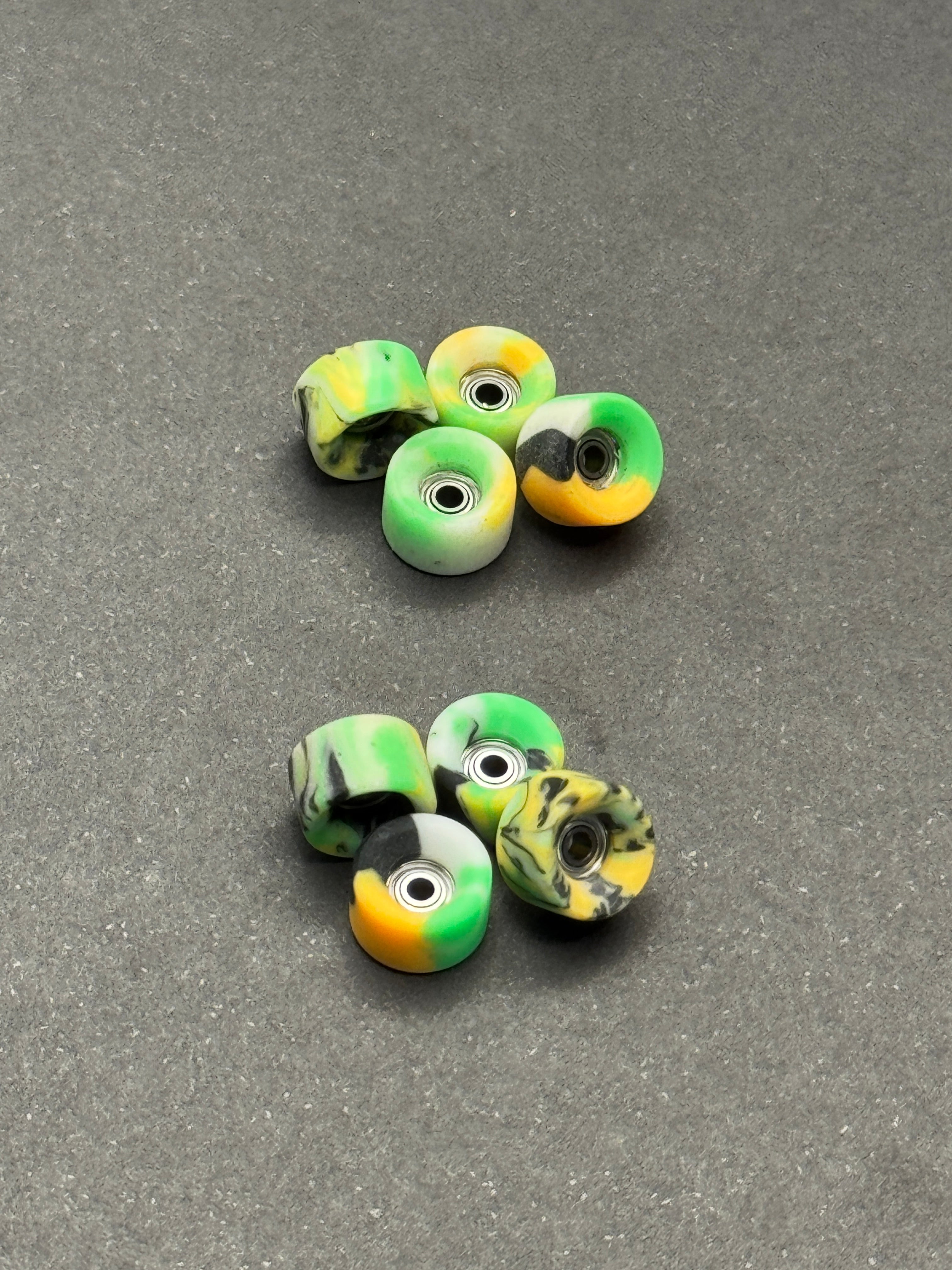 Teak Apex Slim Bowl Swirls GID fingerboard wheels