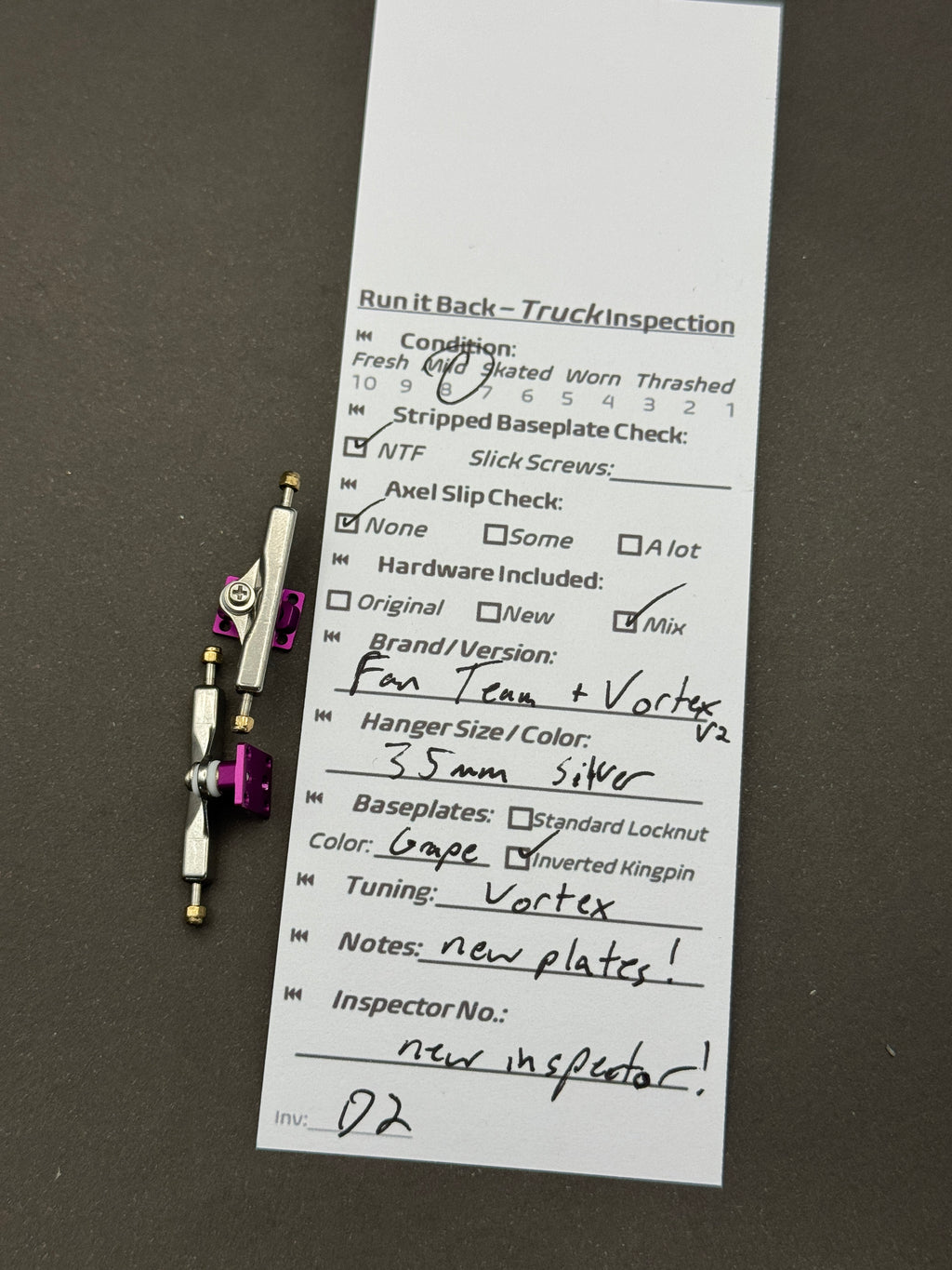 Fan Team + Vortex V2 35mm Silver / Grape trucks – inspection card