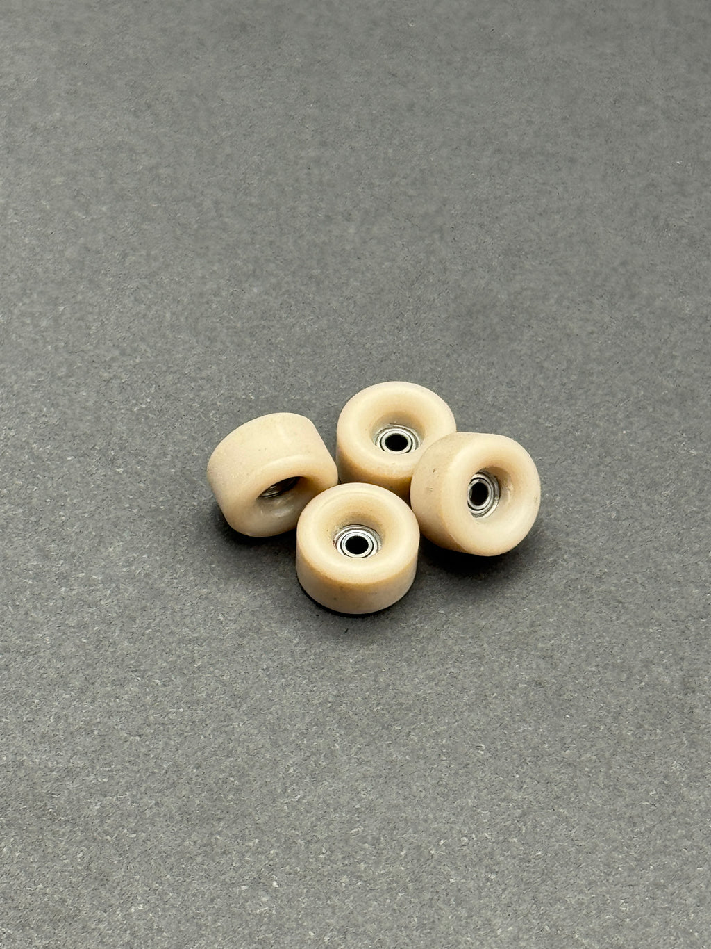 Dudeguy F1 Conical Full Tan fingerboard wheels – product shot
