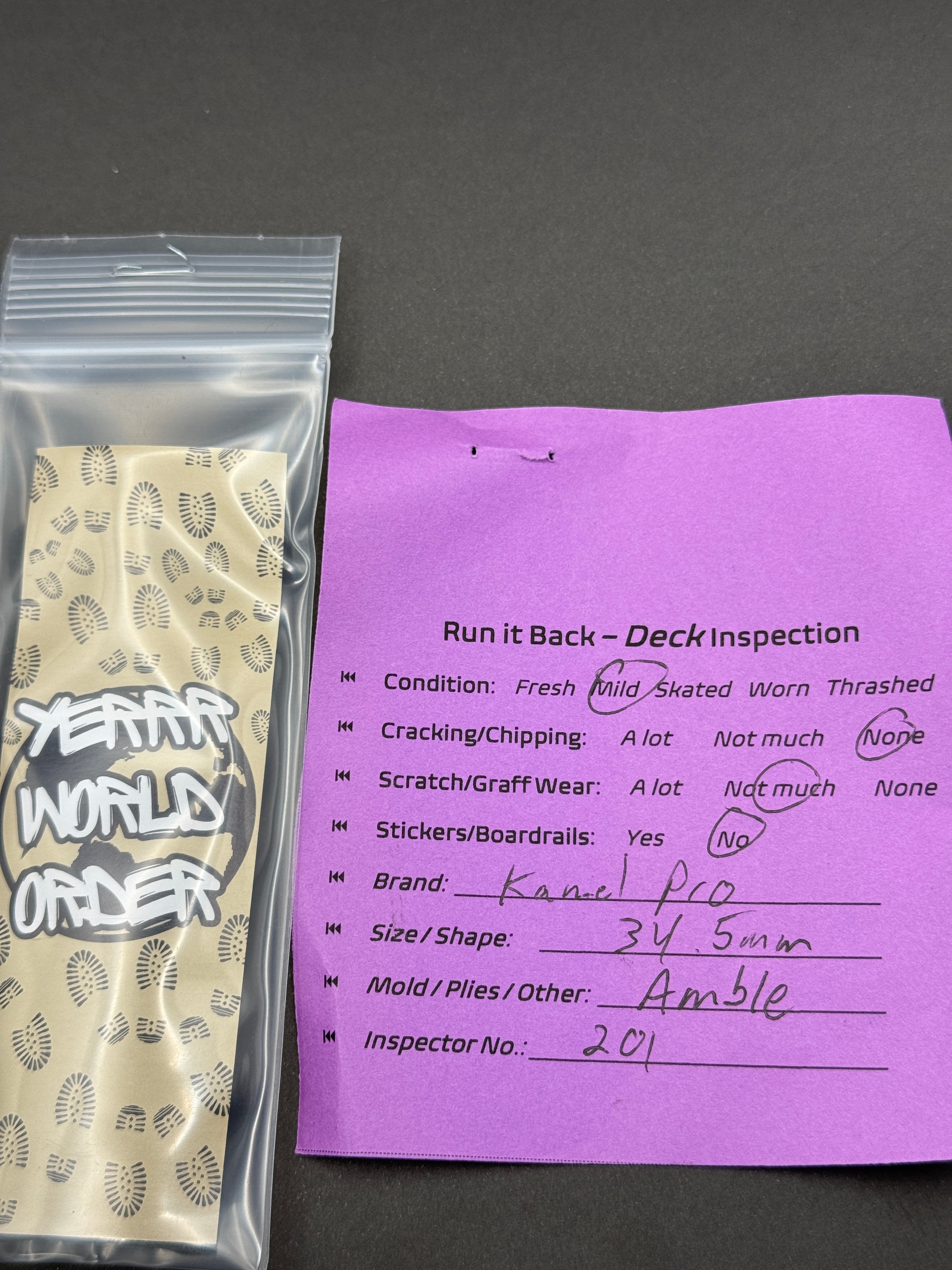Kanel Pro 34.5mm Amble - Mild - inspection card with Yerrr World Order grip tape