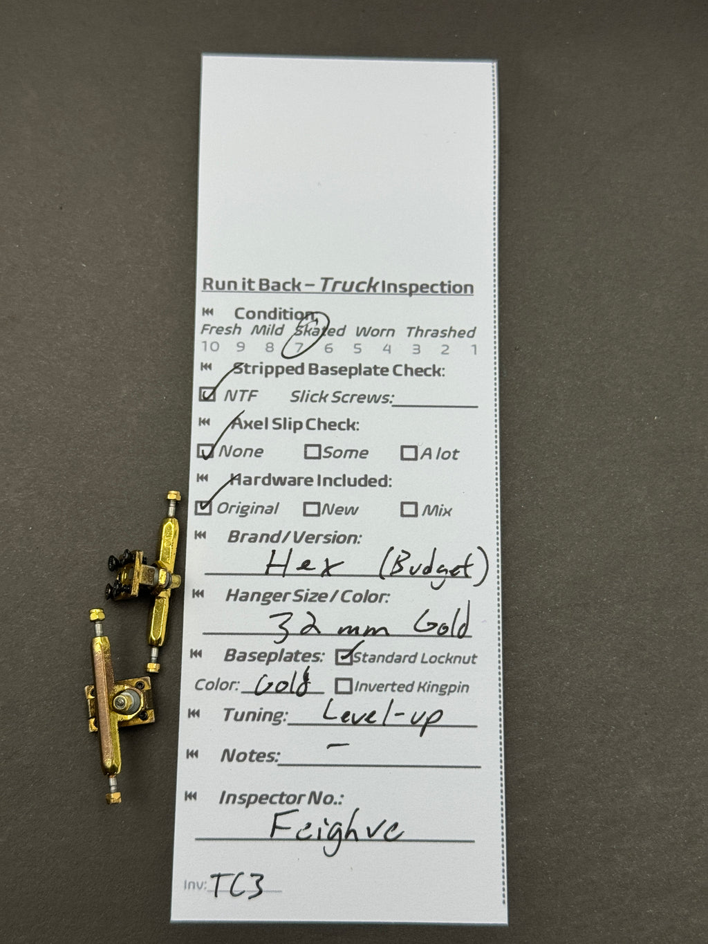 Hex Budget 32mm Gold trucks with inspection card