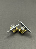 Dynamic 29mm Chrome Gold trucks with inspection card