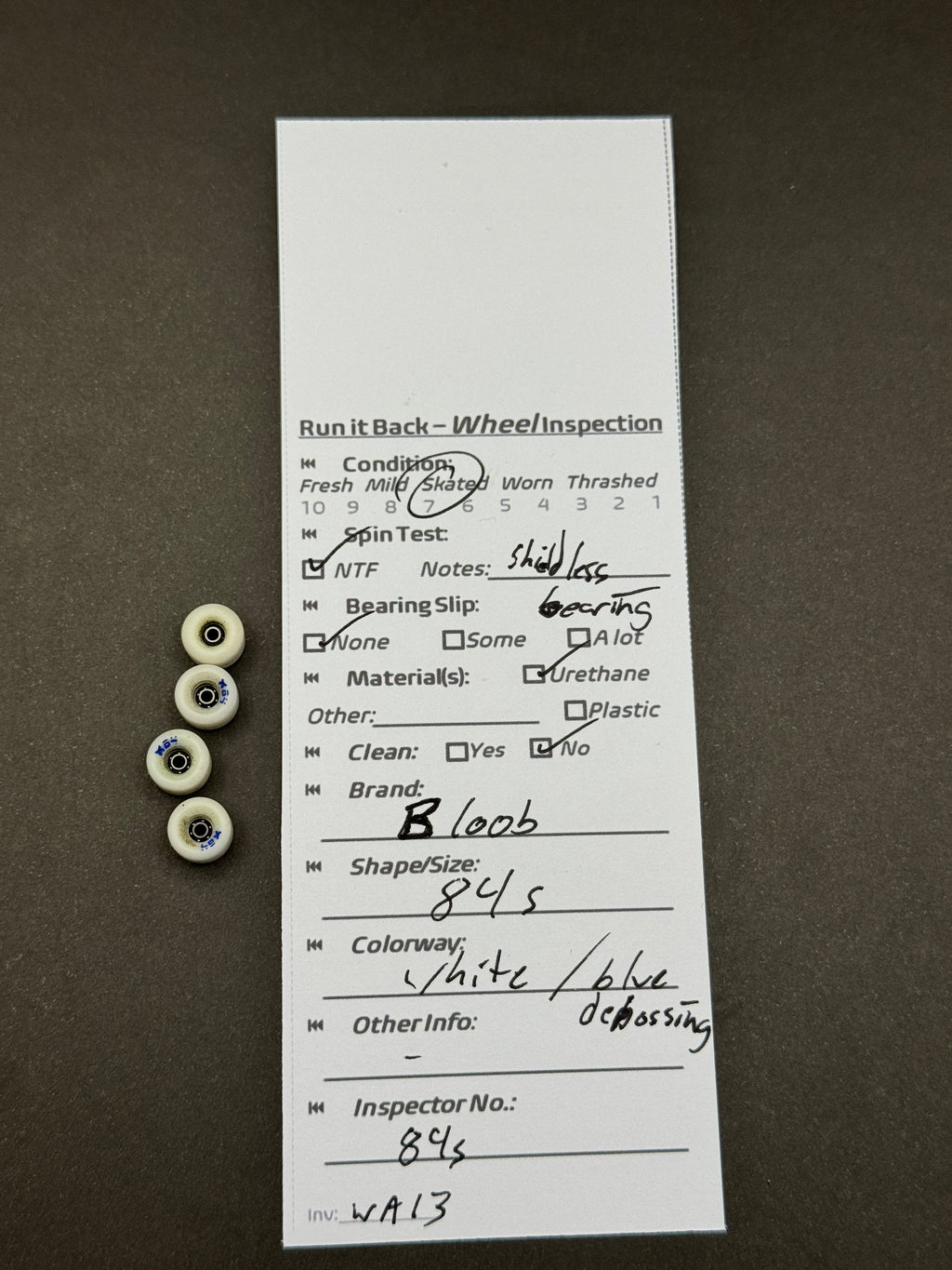 Bloob 84s White Blue fingerboard wheels inspection card