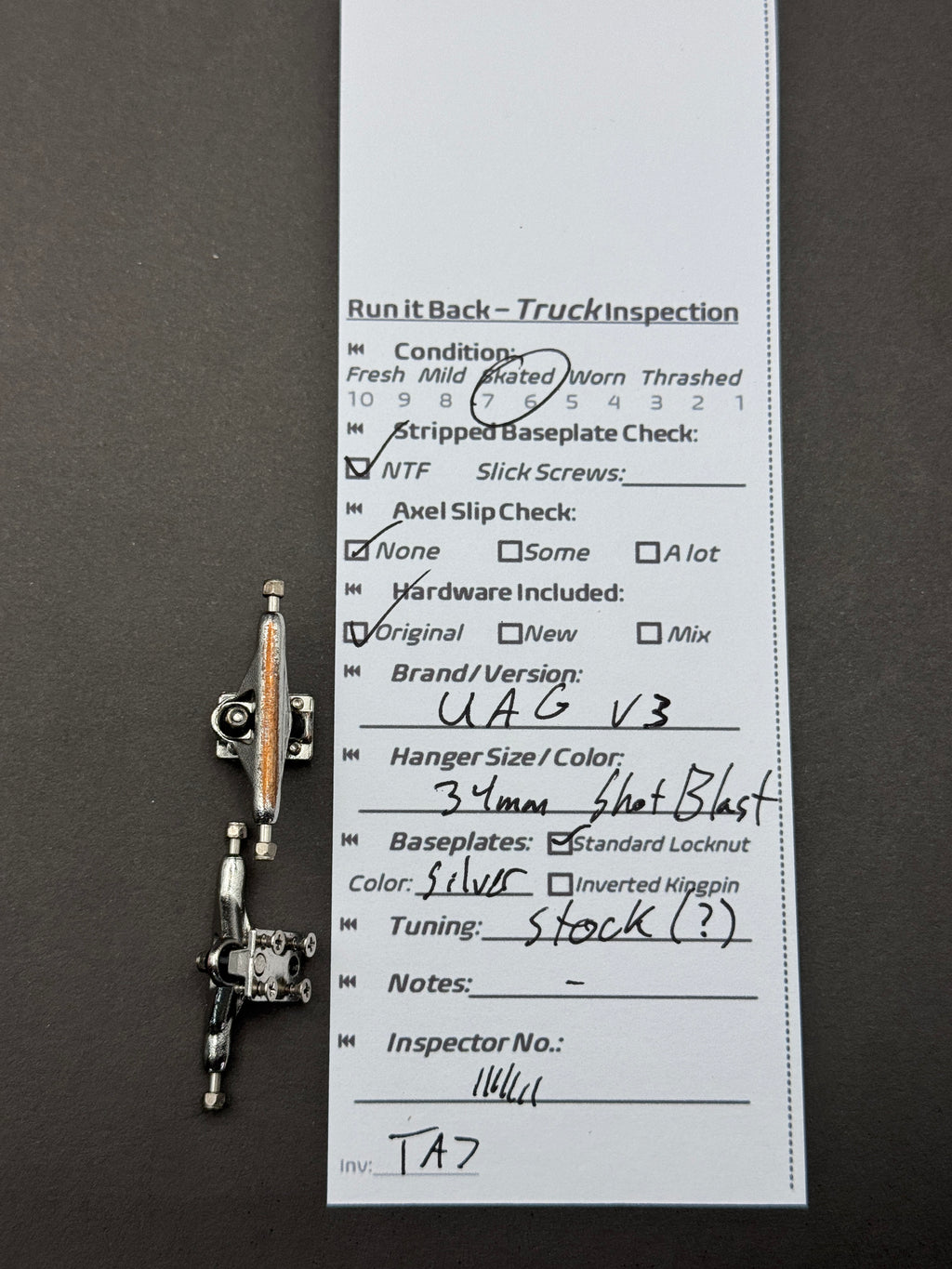 UAG V3 34mm silver and black trucks inspection card