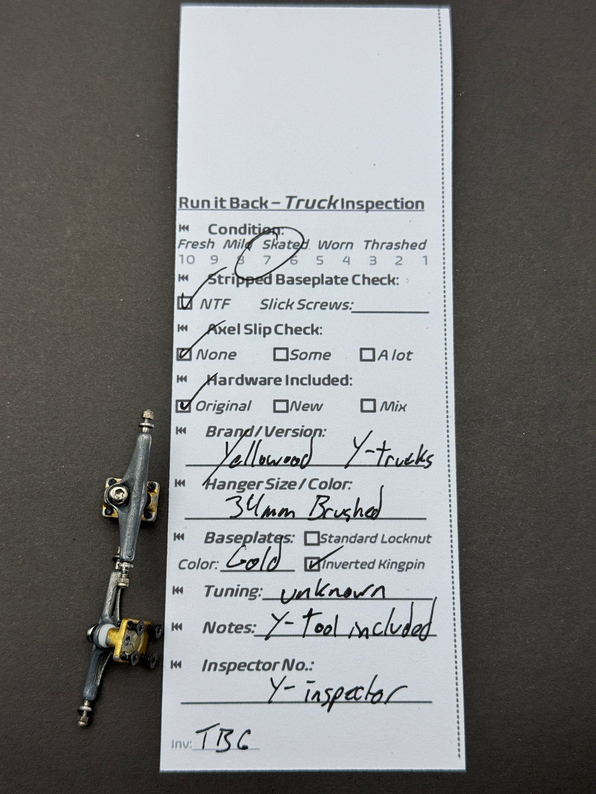 Yellowood Y-Trucks 34mm brushed and gold trucks inspection card