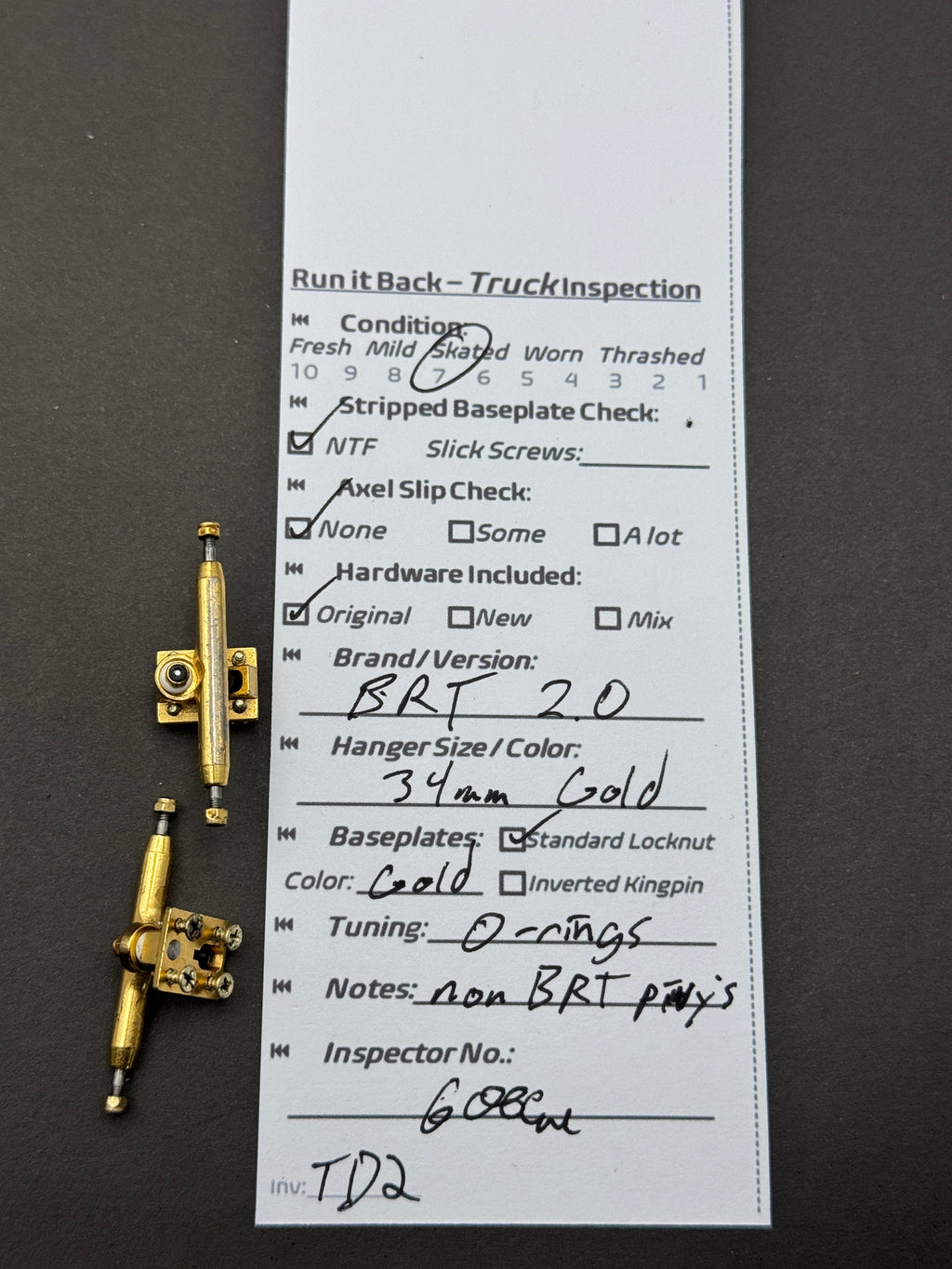 BRT 2.0 34mm gold trucks inspection card
