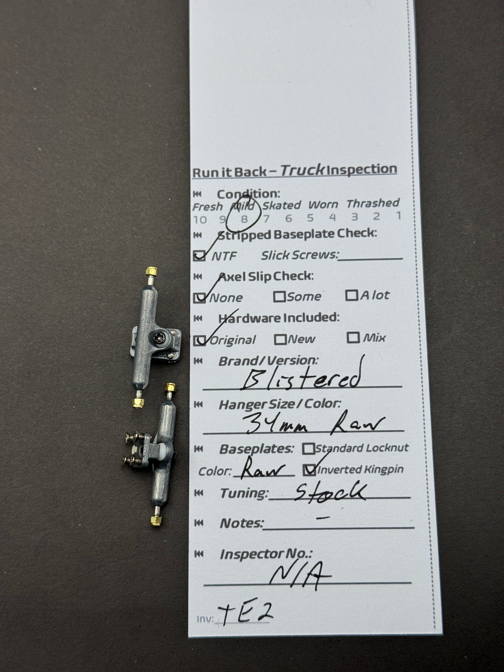 Bustered 34mm Raw trucks inspection card