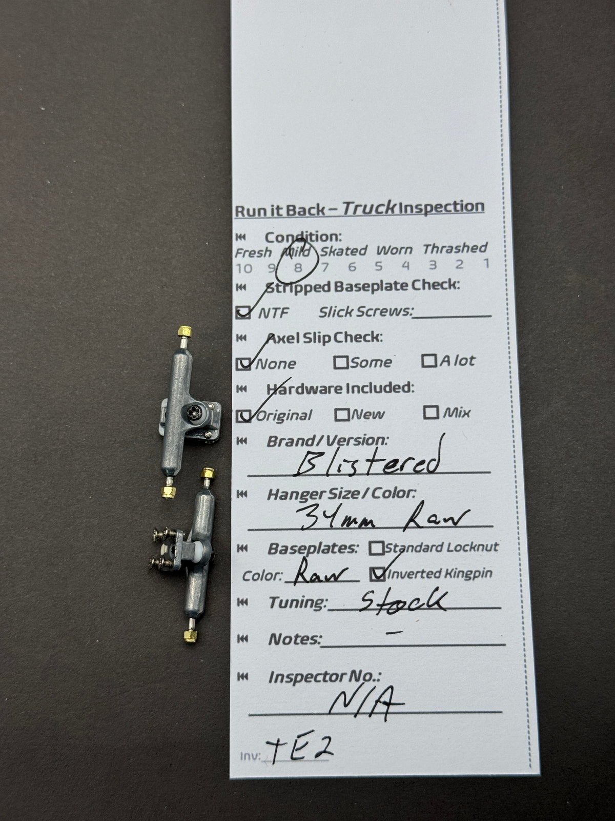 Bustered 34mm Raw trucks inspection card