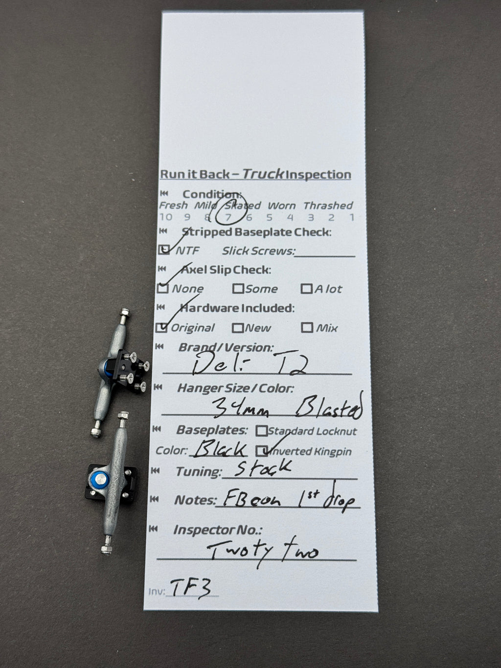 Deli-T2 34mm Blasted / Black trucks inspection card