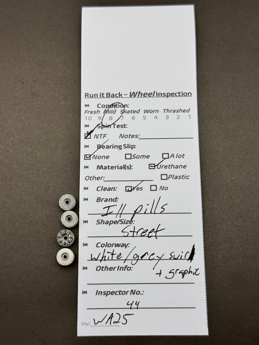 H Pills Street White Grey Swirl inspection card